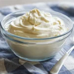 mayonnaise Greek yogurt in a bowl with lemon and herbs
