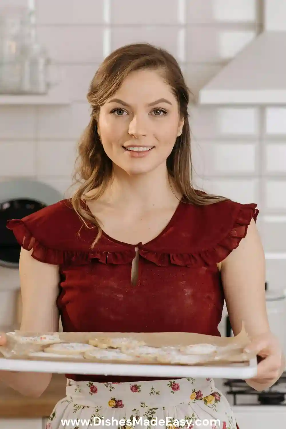 Ashley Wilson smiling in her New York kitchen